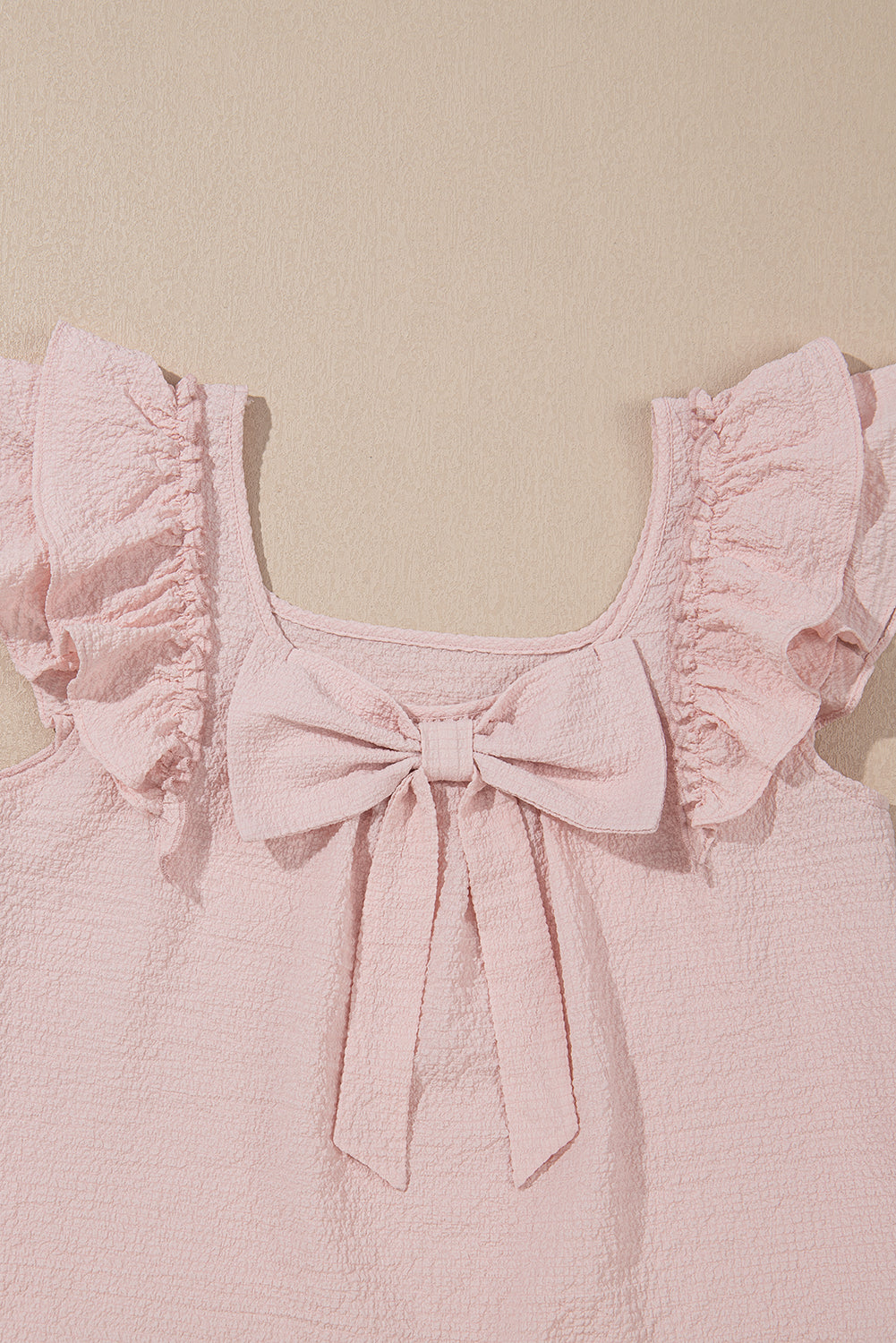 Gossamer Pink Textured Bow Knot Frilled Butterfly Sleeve Blouse