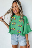 Green Sequin Doughnut Graphic Ruffled Trim Bell Sleeve Mardi Gras Blouse