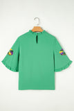 Green Sequin Doughnut Graphic Ruffled Trim Bell Sleeve Mardi Gras Blouse