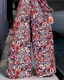 Plus Size Abstract Print Wide Leg Belted Jumpsuit